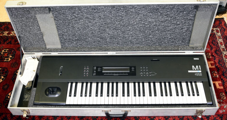 Korg M1 Synthesizer with flight case
